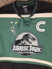 Box Lunch Jurassic Park #93 Captain Lace Up Hockey Jersey Green Adult Small