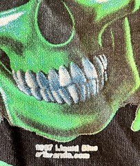 Vintage Liquid Blue Glow In Dark Skull Pile T-Shirt on Port & Co Blank 2007