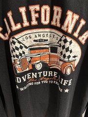 California Tourism T Shirt Size Medium. Black and Orange Long Sleeve Shirt.