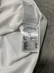 Brand new with tags Lacoste white T-shirt blue ribbed collar Men’s Small