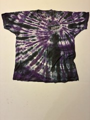Happy Hour tie-dye t-shirt with a spiral pattern