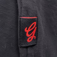 Beautiful Giant Garments black pocket tee with colorful woven/tribal pocket