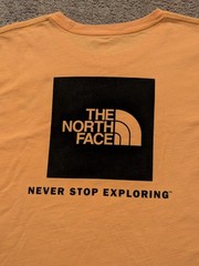 The NORTH FACE Men’s XXL Standard Fit Logo “Never Stop Exploring” Yellow Tshirt