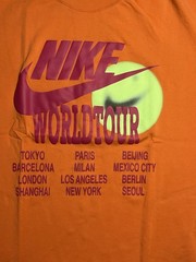 NIKE Small Orange T Shirt World Tour (Small Stain In the Back)