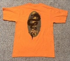 Vintage 1990s JNCO Jeans Orange T-Shirt Boys Youth Large. Made in USA.