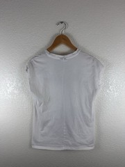 White graphic T-shirt featuring an abstract, hand-drawn fashion