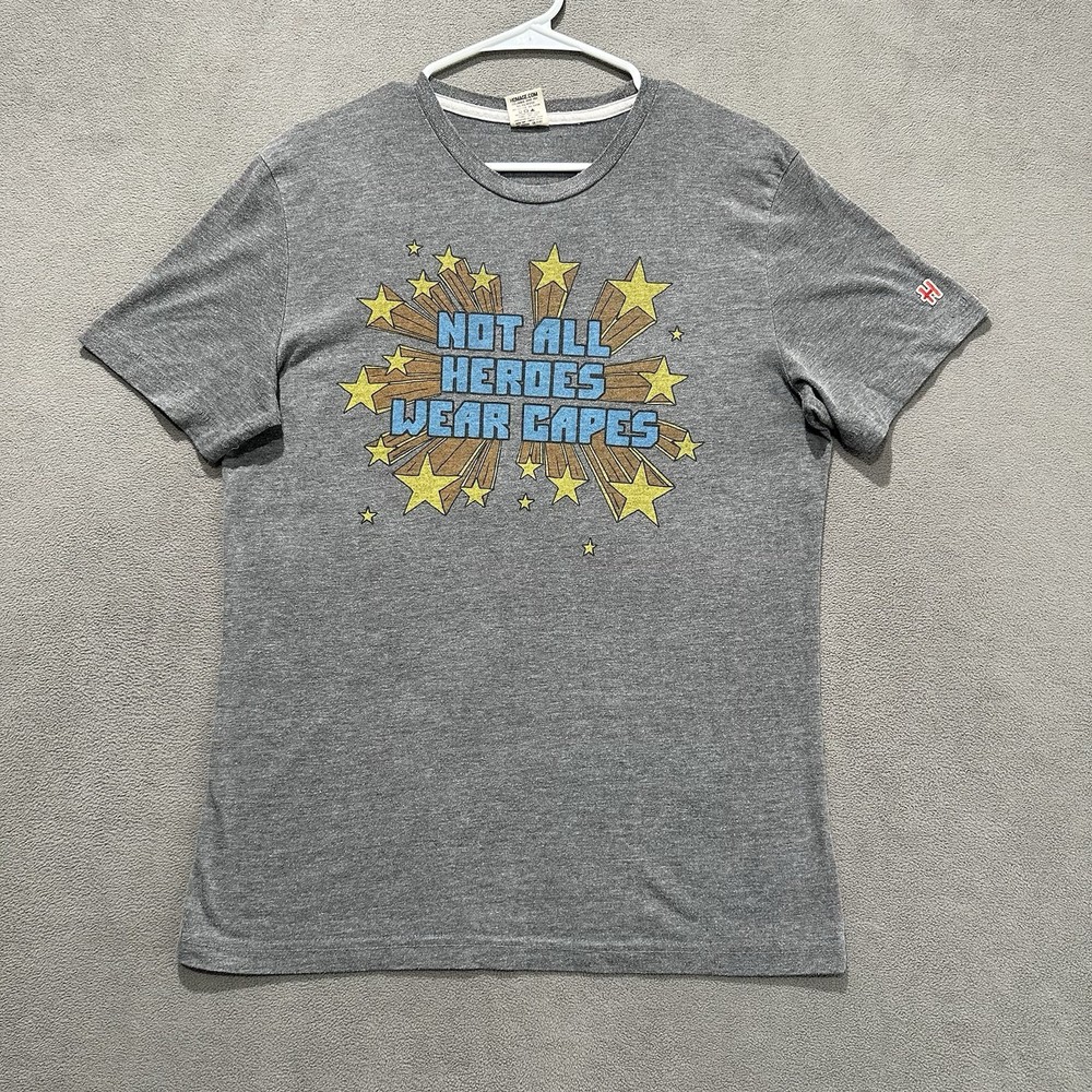 Homage Shirt Mens Medium Gray Not All Heroes Wear Capes Graphic Comic Stars FAIR
