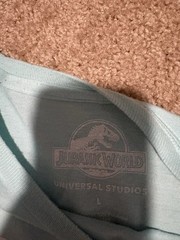 Jurassic World Universal Studios Parks T-Shirt with Poster Art Velocicoaster