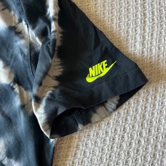 Nike Sportswear Tie-Dye Tee w/ distinctive spiral & neon yellow pixelated logo