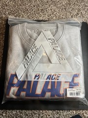 Palace Skateboards 2023 Gigantic Crewneck Sweater Gray Orange And Blue Nyg Logo