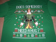 NEW, ELF CHRISTMAS Graphic T shirt, SIZE LARGE, DOES SOMEONE NEED A HUG