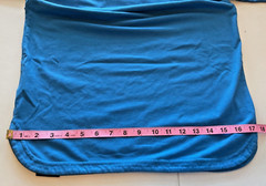 NB New Balance Stretch Blue Pocket T Shirt Unisex size Small Round Slit Hemline
