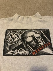 Vintage 1997 Helvetia Bold Art Deco Air Mail Stamp Graphic Shirt Made In USA