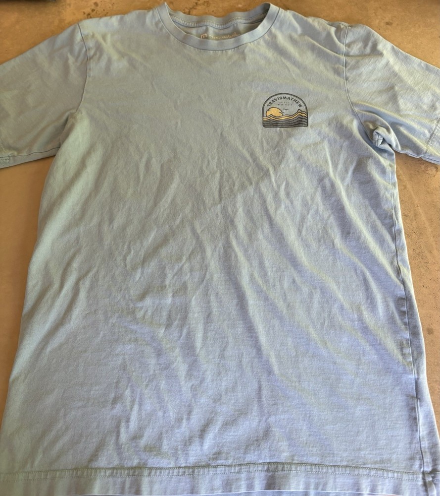TravisMathew Men’s Blue Short Sleeve Crew Neck Graphic Logo Beach Knit T-Shirt