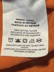 NIKE Small Orange T Shirt World Tour (Small Stain In the Back)