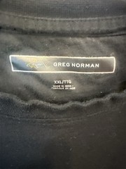 Greg Norman Black pocket Short Sleeve t shirt with Shark logo on the pocket