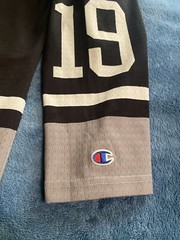 Champion #19 Champion Logo Hockey Jersey Sz L (44) (25in W X 30in L) Black