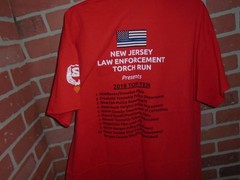 36TH ANNUAL LAW ENFORCEMENT TORCH RUN 2019 MENS TSHIRT WORN 1 TIME