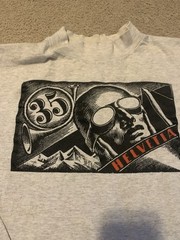 Vintage 1997 Helvetia Bold Art Deco Air Mail Stamp Graphic Shirt Made In USA