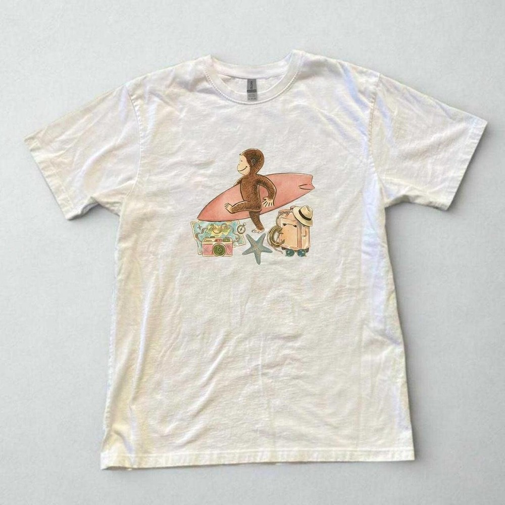 Curious George monkey surfing design graphic tee