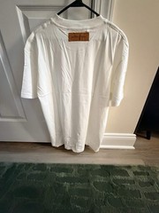 Selling this authentic Louis Vuitton graphic tee