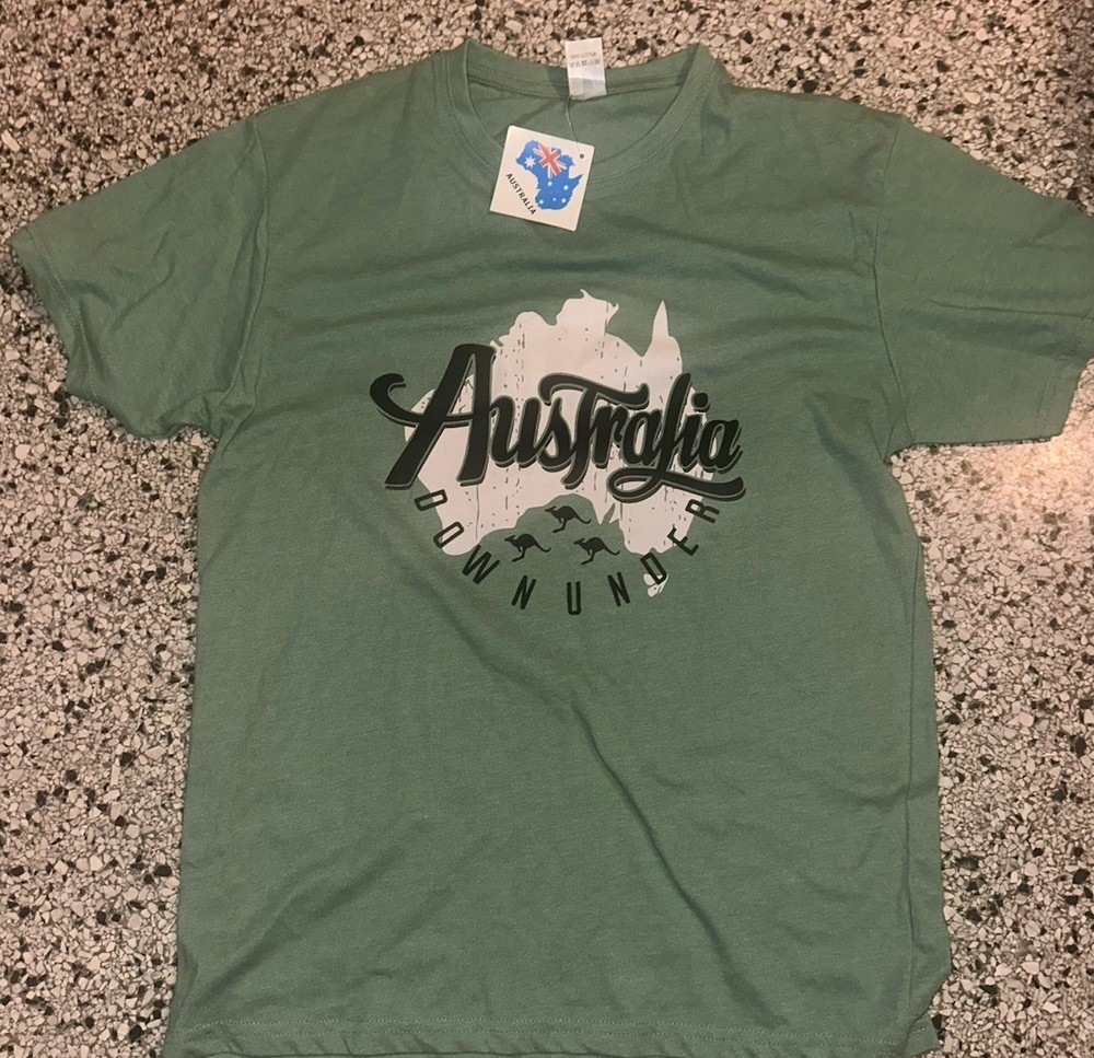 t-shirt features a “Down Under” Australia theme with a kangaroo logo NWT