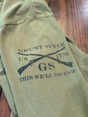 Grunt Style Men’s Long Sleeve Army Green Tshirt – This We’ll Defend – L