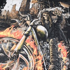 Biker style T-Shirt. Skeleton on a Burning Motorcycle.