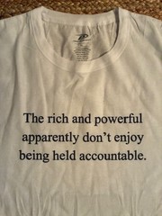 T-Shirt funny satire “The rich and powerful don’t enjoy being held accountable.”