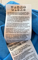 NB New Balance Stretch Blue Pocket T Shirt Unisex size Small Round Slit Hemline