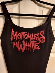 Motionless in white crop top Red Glitter Logo motionless in white tank top