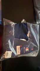 Three champion T-shirts, and one pair of socks