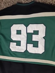 Box Lunch Jurassic Park #93 Captain Lace Up Hockey Jersey Green Adult Small