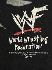 Vintage 2000 (WWF) t-shirt Of Dwayne “The Rock” Johnson on a black cotton tee.
