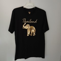 Thailand souvenir shirt featuring a detailed gold-colored elephant