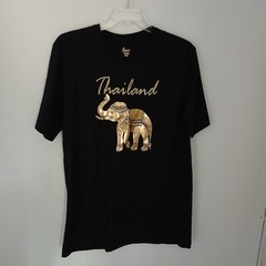 Thailand souvenir shirt featuring a detailed gold-colored elephant