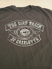 The Dirt Track At Charlotte Tee Shirt Black, White Letters 20in Across 27in Long