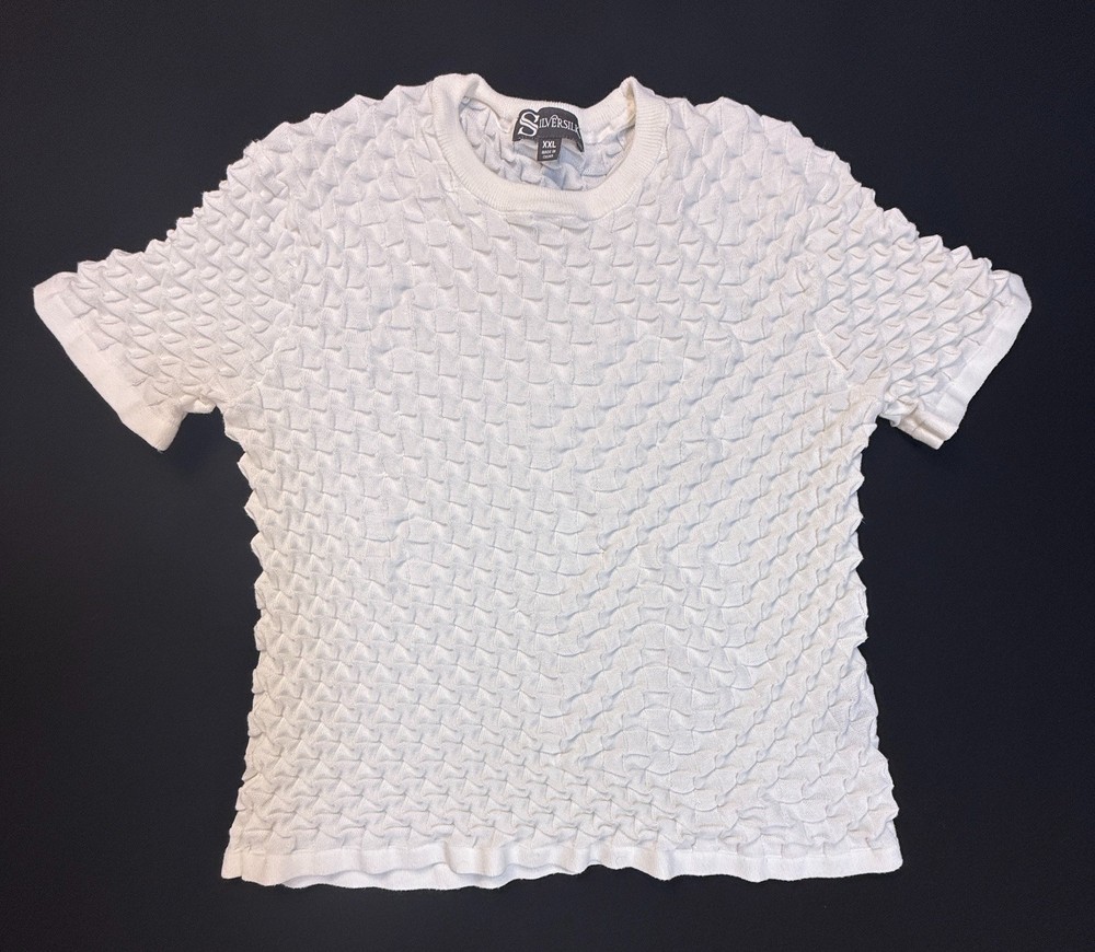 Silversilk textured knit with a raised geometric pattern; white XX (slim)