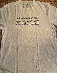 T-Shirt funny satire “The rich and powerful don’t enjoy being held accountable.”