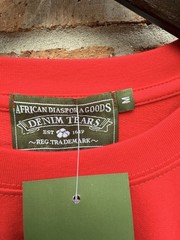 DENIM TEARS Men’s Red Graphic Logo Crew Neck Short Sleeve T-Shirt Size M