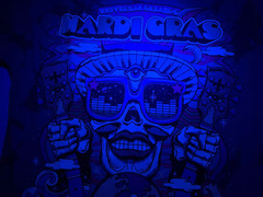 Universal Studios Orlando Mardi Gras Tshirt 2024 Mushrooms Skull Black Light NWT