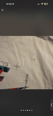 Nike world wide white t-shirt with multicolored Nike swoosh graphic
