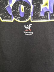 Vintage 2000 (WWF) t-shirt Of Dwayne “The Rock” Johnson on a black cotton tee.