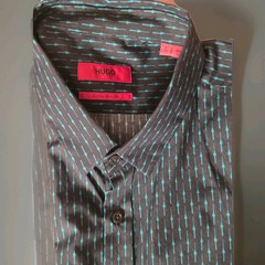 HUGO BOSS branded shirt featuring a distinctive all-over print in black and teal