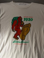 Eddie Bauer Sasquatch t-shirt features a red bigfoot graphic with a g