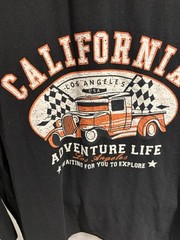 California Tourism T Shirt Size Medium. Black and Orange Long Sleeve Shirt.