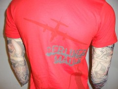 SARAVANA VOGELPOHL TSHIRT Designer Boutique Brand BERLIN Gun ESPIONAGE Red MED