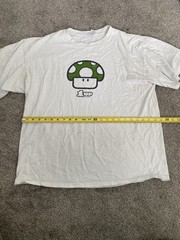 1up mushroom shirt mario promo from 2004 with visible stains as shown