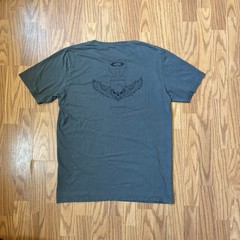 Oakley dark grey t-shirt with skull design. Mens Size L