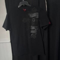 Black and grey streetwear-inspired T-shirt size xl looks smaller